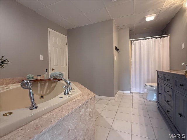 632 N Lafitte Dr, Bonne Terre, MO 63628 - full bath featuring tile patterned flooring, a paneled ceiling, a tub with jets, toilet, and vanity