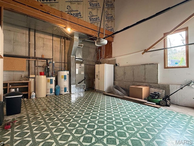 632 N Lafitte Dr, Bonne Terre, MO 63628 - below grade area with water heater, tile patterned floors, electric water heater, and heating unit