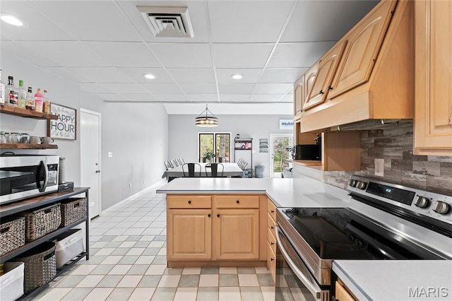 632 N Lafitte Dr, Bonne Terre, MO 63628 - kitchen featuring stainless steel appliances, tasteful backsplash, a peninsula, a paneled ceiling, and light brown cabinets
