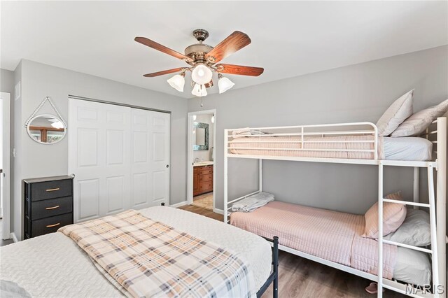 632 N Lafitte Dr, Bonne Terre, MO 63628 - bedroom with a closet, wood finished floors, ceiling fan, and baseboards