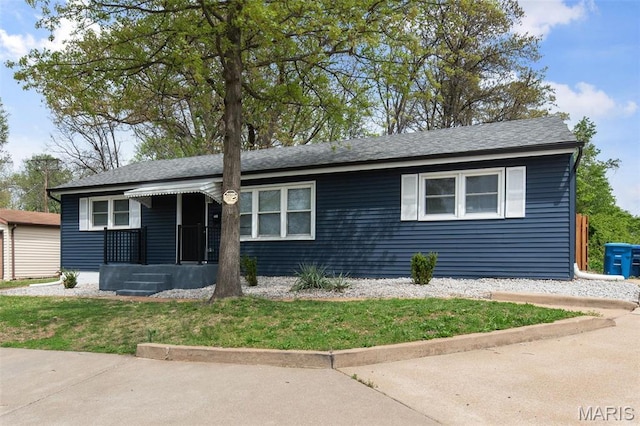 449 Hillcrest Blvd, Ballwin, MO 63021 - view of front of home featuring a front lawn and a shingled roof