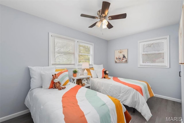 449 Hillcrest Blvd, Ballwin, MO 63021 - bedroom featuring baseboards, wood finished floors, and a ceiling fan