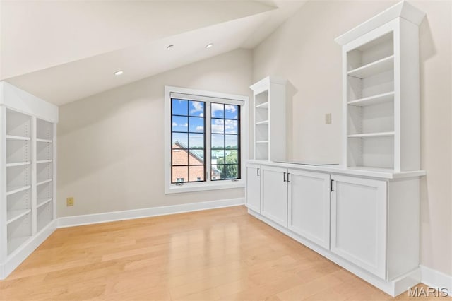 6 Brighton Way Unit 4D, Clayton, MO 63105 - bonus room featuring light wood-style floors, lofted ceiling, and recessed lighting