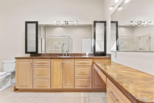 6 Brighton Way Unit 4D, Clayton, MO 63105 - full bathroom featuring vanity, tiled shower, and tile patterned floors