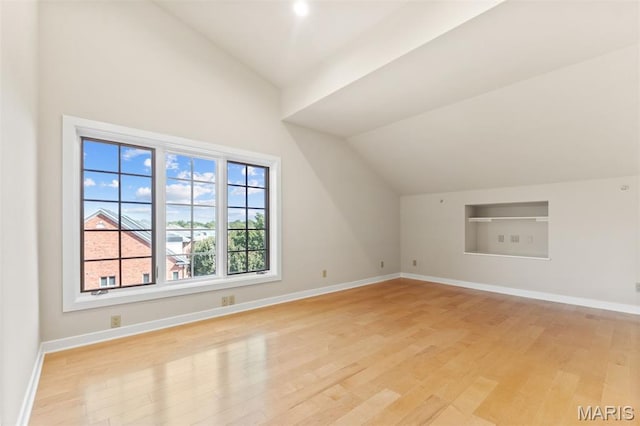 6 Brighton Way Unit 4D, Clayton, MO 63105 - additional living space with vaulted ceiling, light wood-style flooring, and built in features