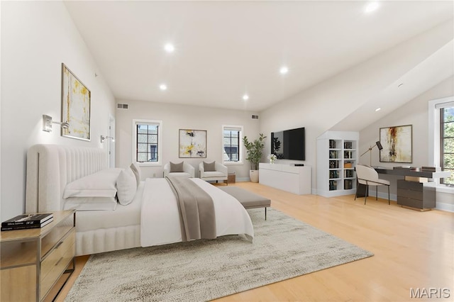 6 Brighton Way Unit 4D, Clayton, MO 63105 - bedroom with multiple windows, wood finished floors, and recessed lighting