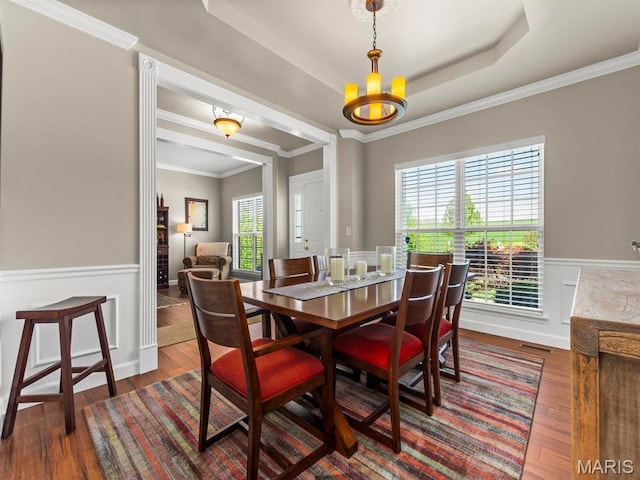 1509 Cedar Ridge Dr, Ofallon, IL 62269 - dining room with wainscoting, wood finished floors, ornamental molding, and a tray ceiling