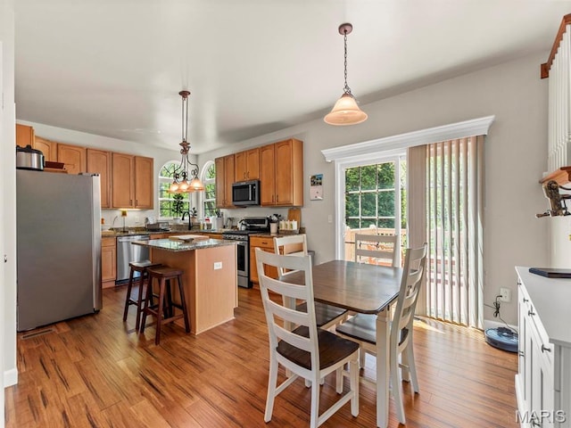 1509 Cedar Ridge Dr, Ofallon, IL 62269 - dining area with wood finished floors