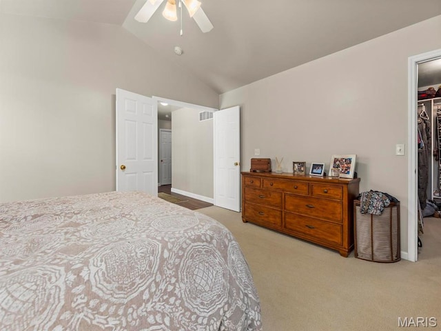 1509 Cedar Ridge Dr, Ofallon, IL 62269 - carpeted bedroom with a spacious closet, lofted ceiling, a closet, baseboards, and a ceiling fan