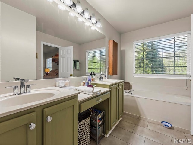 1509 Cedar Ridge Dr, Ofallon, IL 62269 - bathroom with double vanity, tile patterned flooring, and a garden tub