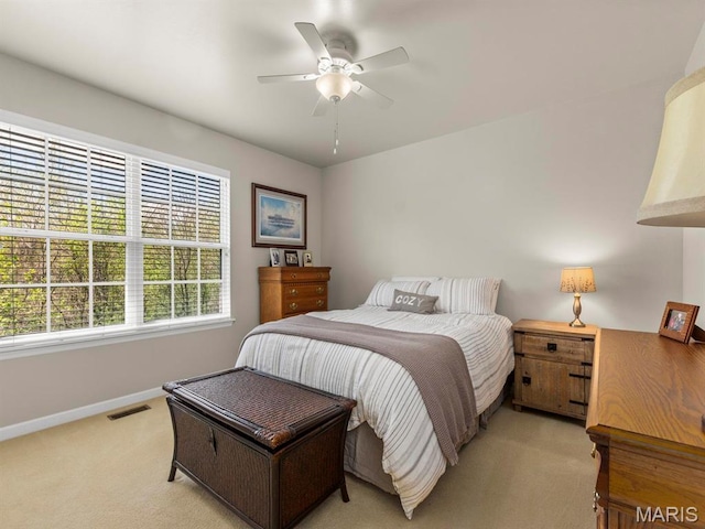 1509 Cedar Ridge Dr, Ofallon, IL 62269 - bedroom with light colored carpet, baseboards, and a ceiling fan
