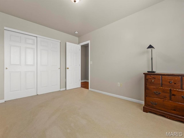 1509 Cedar Ridge Dr, Ofallon, IL 62269 - bedroom with carpet flooring, baseboards, and a closet