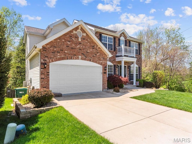 1509 Cedar Ridge Dr, Ofallon, IL 62269 - view of front of house with a balcony, concrete driveway, brick siding, a garage, and a front yard