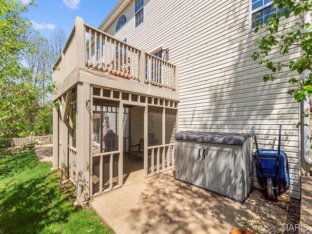 1509 Cedar Ridge Dr, Ofallon, IL 62269 - rear view of house featuring a wooden deck and a patio