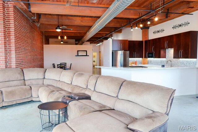 1015 Washington Ave Unit 507, Saint Louis, MO 63101 - living area with concrete flooring and a ceiling fan