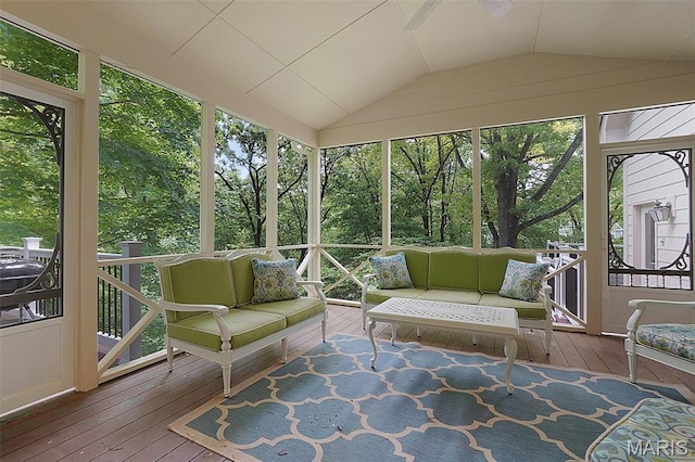 1508 Pacland Ridge Ct, Chesterfield, MO 63005 - sunroom / solarium featuring an outdoor hangout area, lofted ceiling, and view of wooded area