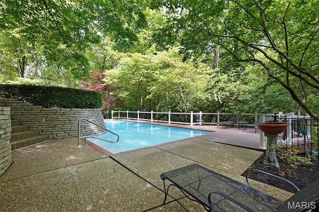 1508 Pacland Ridge Ct, Chesterfield, MO 63005 - view of swimming pool with a patio and an outdoor fire pit