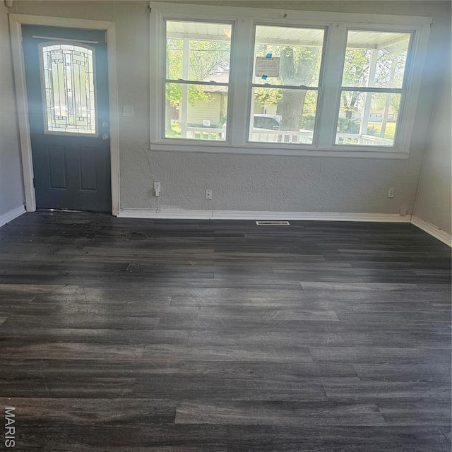 600 Plum, Cahokia, IL 62206 - entryway with baseboards and dark wood-type flooring