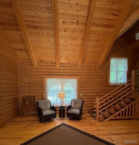 577 Schluersburg Rd, Augusta, MO 63332 - living area with wood ceiling, log walls, and wood finished floors