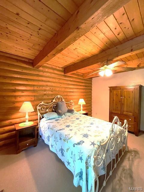577 Schluersburg Rd, Augusta, MO 63332 - bedroom with rustic walls, light colored carpet, wood ceiling with exposed beams, and a ceiling fan
