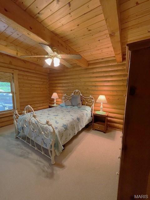 577 Schluersburg Rd, Augusta, MO 63332 - bedroom with wooden ceiling with exposed beams, log walls, carpet flooring, and a ceiling fan