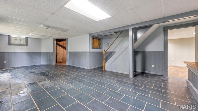28470 Sunnyside Rd, Warrenton, MO 63383 - below grade area with stairs, wainscoting, and a paneled ceiling