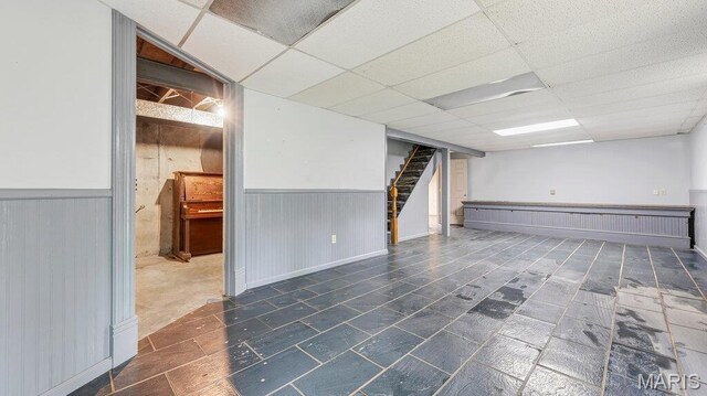 28470 Sunnyside Rd, Warrenton, MO 63383 - finished basement featuring stairs, wainscoting, and a drop ceiling