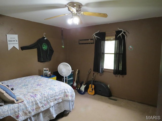 bedroom with carpet floors and ceiling fan