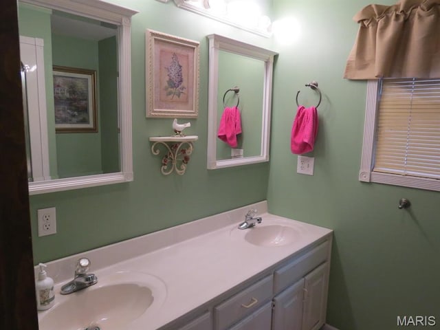 full bathroom featuring double vanity