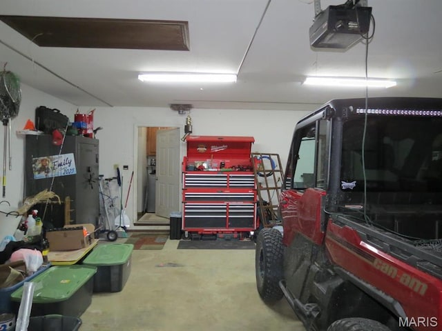 garage featuring a garage door opener