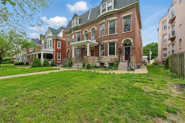 4366 W Pine Blvd Unit Cw, Saint Louis, MO 63108 - view of front of home with mansard roof, brick siding, and a residential view