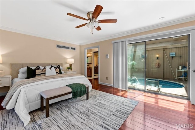 bedroom featuring access to outside, wood finished floors, ornamental molding, a ceiling fan, and ensuite bath