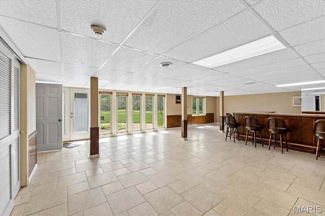 interior space with a drop ceiling