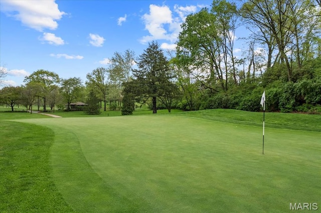 2244 Kehrsglen Ct, Clarkson Valley, MO 63005 - view of home's community with golf course view, a putting area, view of wooded area, and a yard