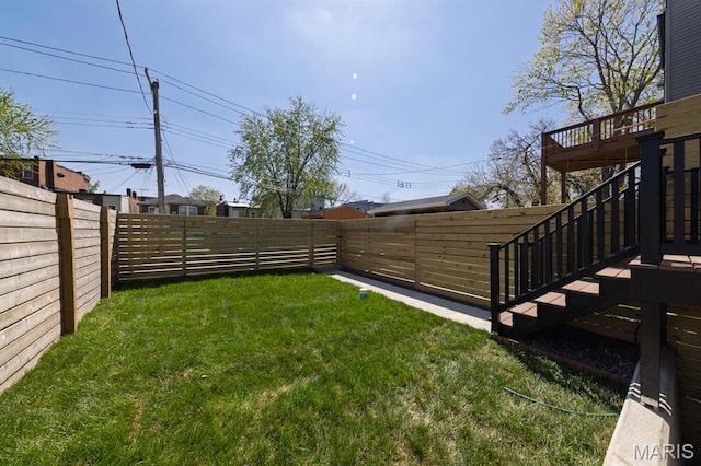 view of yard featuring stairs and a deck