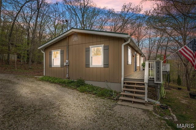 13219 Apache Point Dr, Saint Genevieve, MO 63670 - view of side of home with a deck and stairs