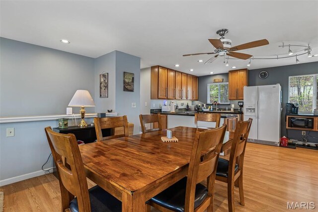 13219 Apache Point Dr, Saint Genevieve, MO 63670 - dining area with light wood-style flooring, a ceiling fan, healthy amount of natural light, recessed lighting, and rail lighting