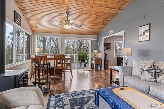 13219 Apache Point Dr, Saint Genevieve, MO 63670 - living area with vaulted ceiling, plenty of natural light, ceiling fan, wooden ceiling, and wood finished floors
