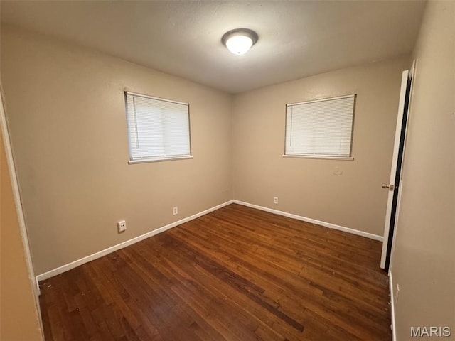 10115 Saffron Dr, Saint Louis, MO 63136 - unfurnished room with wood finished floors and baseboards