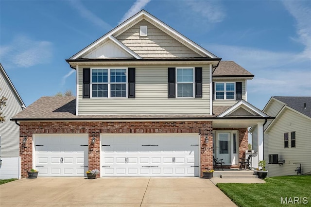 1338 Orchard Lakes Cir, Belleville, IL 62220 - view of front of house featuring brick siding, concrete driveway, a garage, and a shingled roof