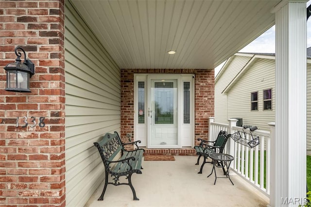 1338 Orchard Lakes Cir, Belleville, IL 62220 - view of patio / terrace featuring covered porch