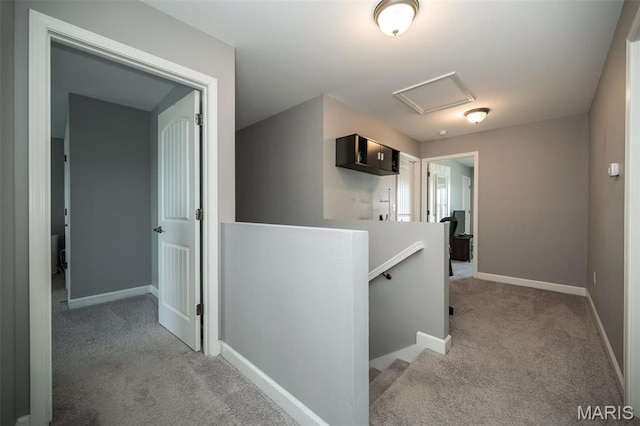 1338 Orchard Lakes Cir, Belleville, IL 62220 - hallway featuring an upstairs landing, light colored carpet, baseboards, and attic access