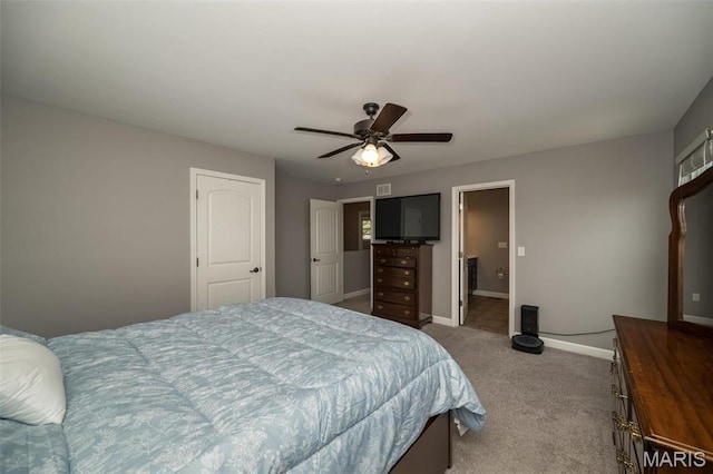 1338 Orchard Lakes Cir, Belleville, IL 62220 - carpeted bedroom featuring baseboards and a ceiling fan