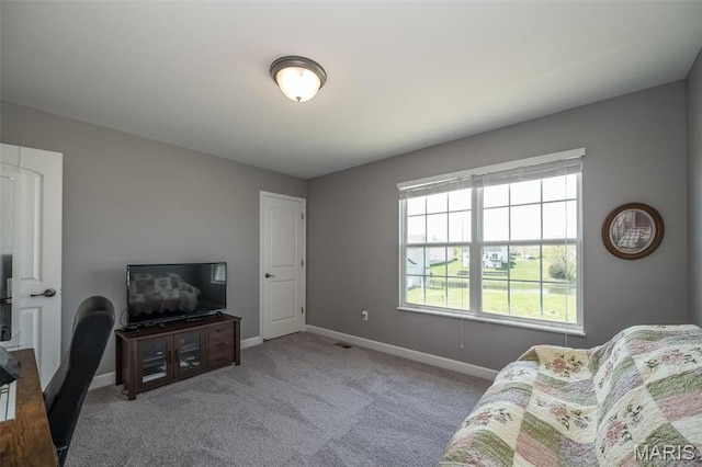 1338 Orchard Lakes Cir, Belleville, IL 62220 - carpeted living room with baseboards