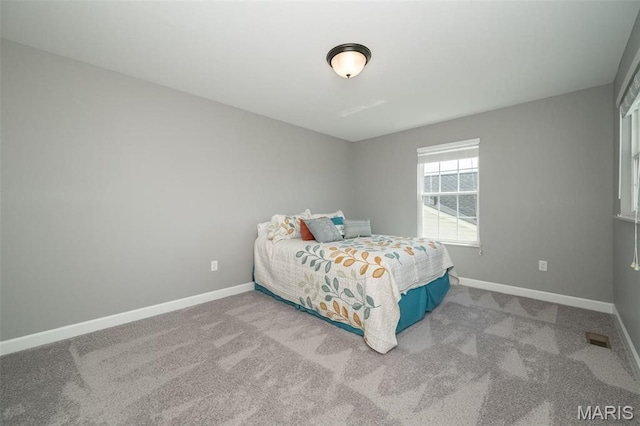 1338 Orchard Lakes Cir, Belleville, IL 62220 - bedroom with carpet floors and baseboards