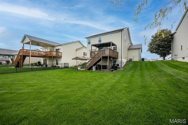 1338 Orchard Lakes Cir, Belleville, IL 62220 - rear view of property with stairway, a wooden deck, and a ceiling fan
