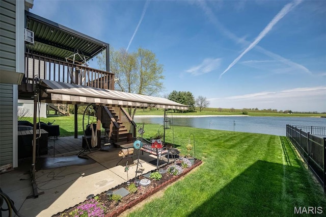 1338 Orchard Lakes Cir, Belleville, IL 62220 - view of yard featuring stairs, a patio area, and a deck with water view