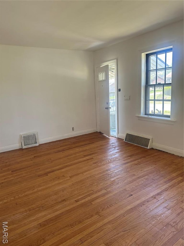 3460 Oakdale Ave, Saint Louis, MO 63121 - entryway with wood finished floors and baseboards