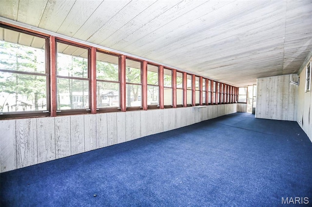 5507 Sassafras Ln, High Ridge, MO 63049 - unfurnished sunroom with carpet, wood ceiling, and wood walls