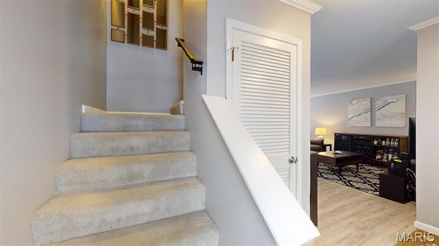 156 Cascade Terrace Dr, Ballwin, MO 63021 - staircase featuring wood finished floors and crown molding